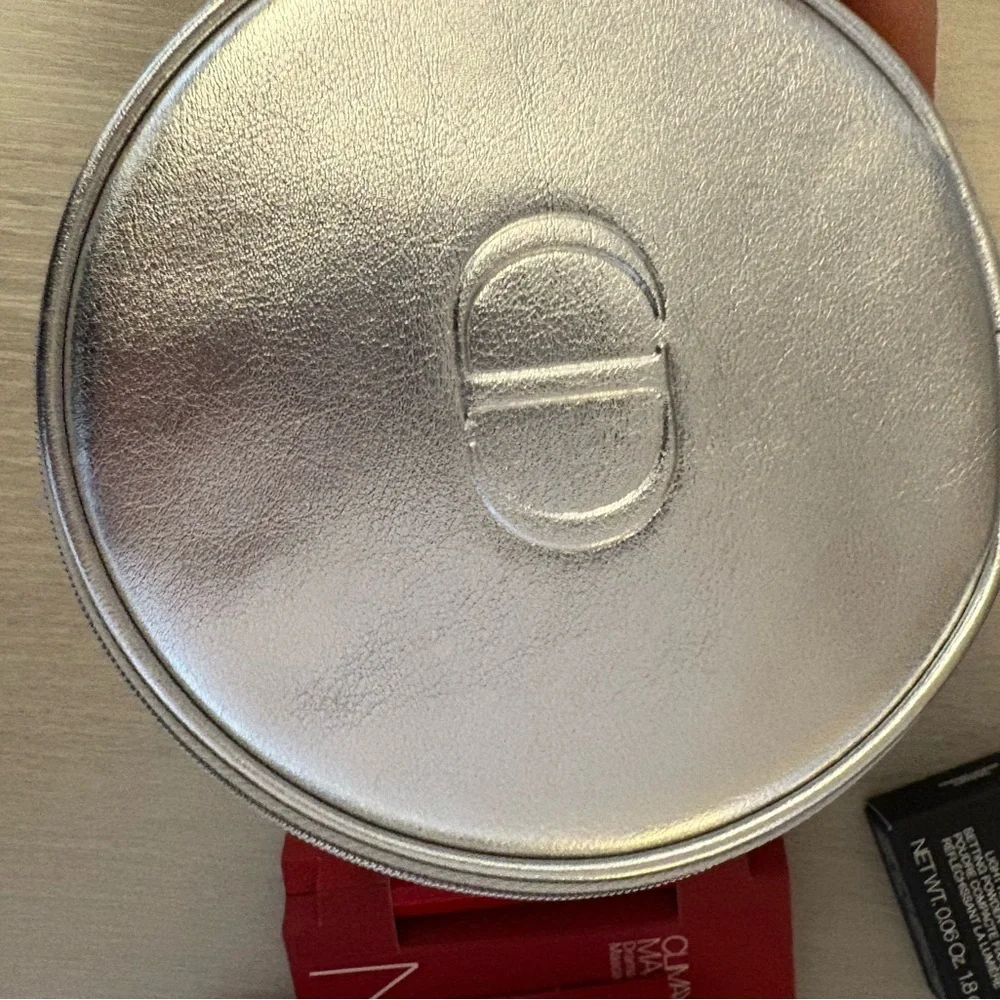 Dior silver  Cosmetic Pouch with Nars cosmetics‎ inside